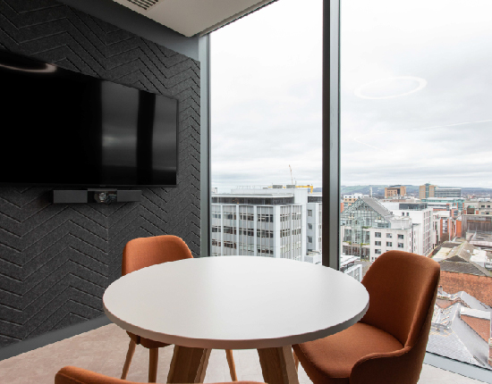 Office refurbishment or relocation? Small meeting room with floor to ceiling windows overlooking the Belfast skyline 