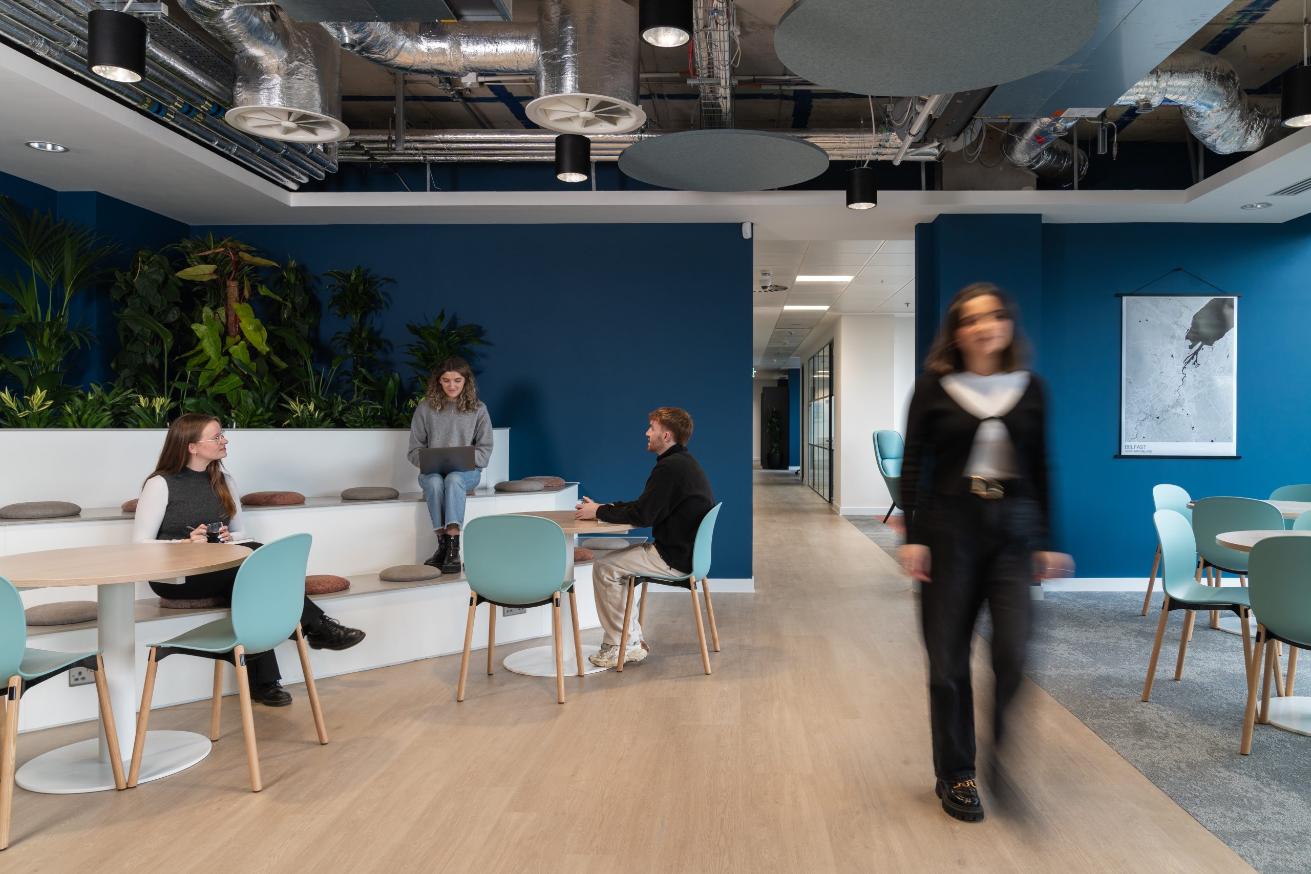 team collaborating in office space to form a community