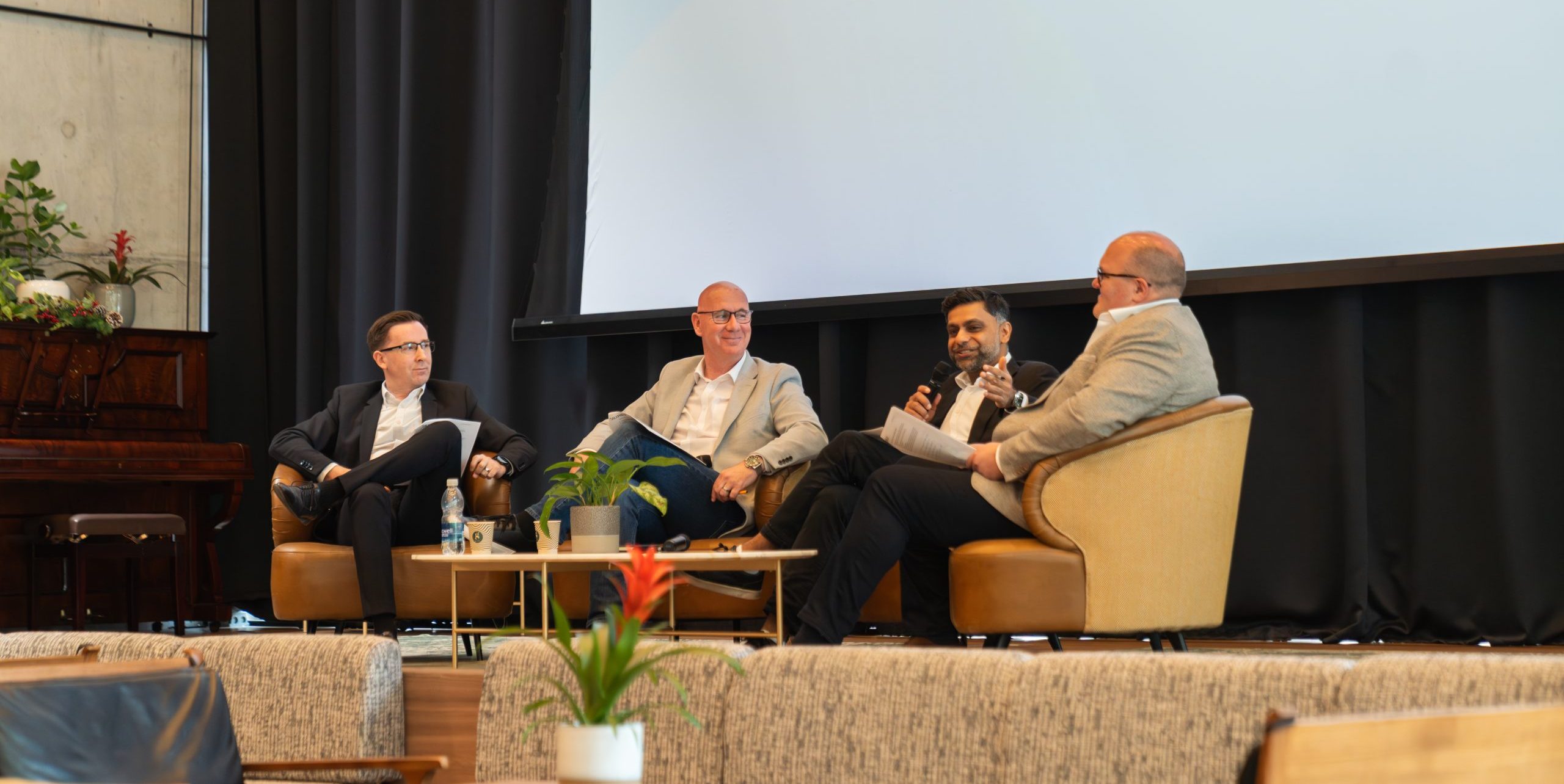 industry experts discussing on panel the topic of workplace wellbeing