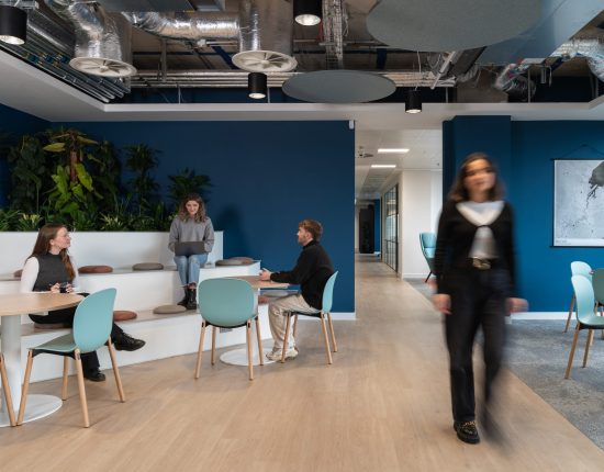team collaborating in office space to form a community