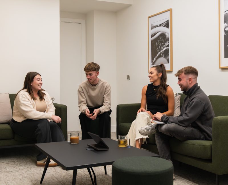 co-workers having a conversation in wellbeing room