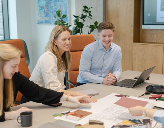 co-workers working together on project